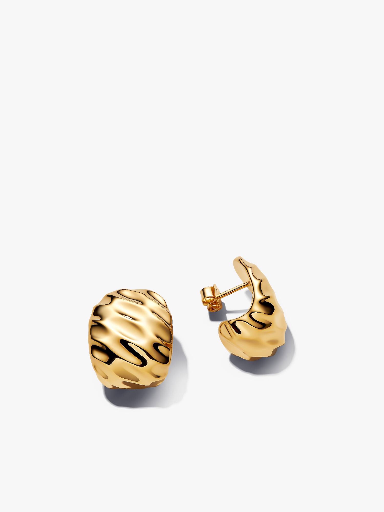 Aretes de aro anchos ondulados
