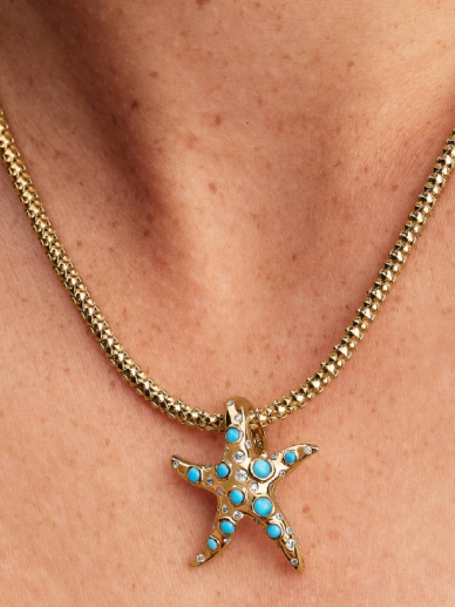 Charm colgante Estrella de mar azul reluciente