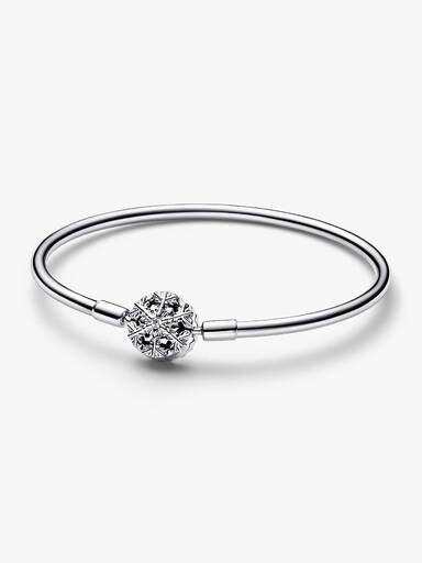 Sterling silver bangle with snowflake clasp and clear cubic zirconia