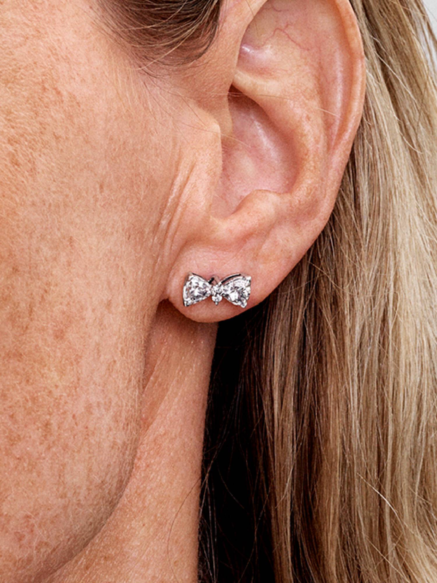 Aretes de botón Moño reluciente