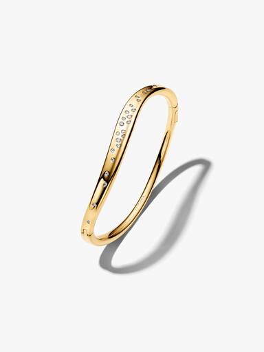 Brazalete rígido con forma orgánica engastado con piedras