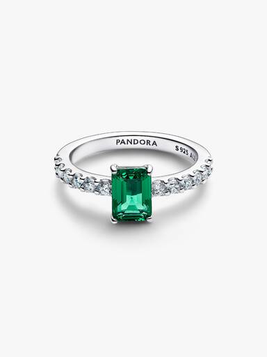 Anillo rectangular verde reluciente con halo