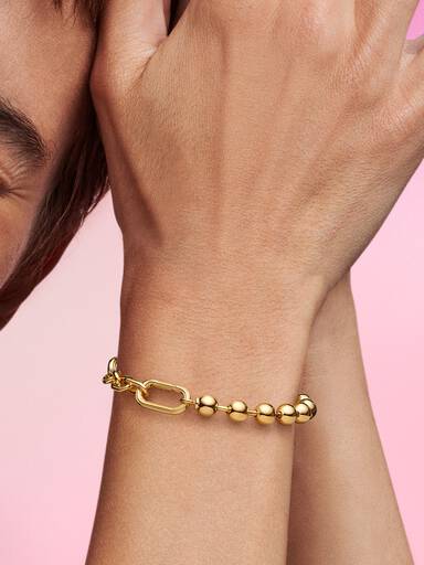 Brazalete de cadena de eslabones y cuentas de metal